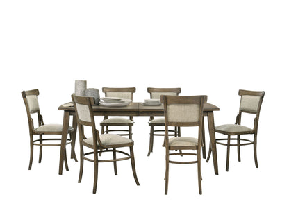 The Bistro Dining Table comes with six off white fabric chairs. The table is styled with stacked plates and ceramic vases, shown on a clean white background.