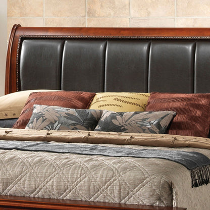 A neatly made Lavita Storage Bed with a dark, padded leather headboard, beige quilted blanket, brown and patterned throw pillows, plus a tan and yellow accent pillow, set against a tiled wall.