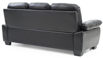 The Marta - Sofa is a black leather sofa with three seat backs, shown from behind at an angle against a white background.