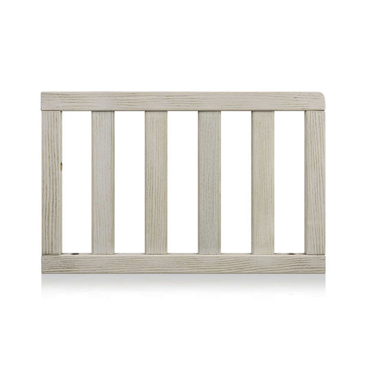 The Barnside - Toddler Guard Rail features a rectangular, light wood design with vertical slats and minimalist style, shown against a white background.