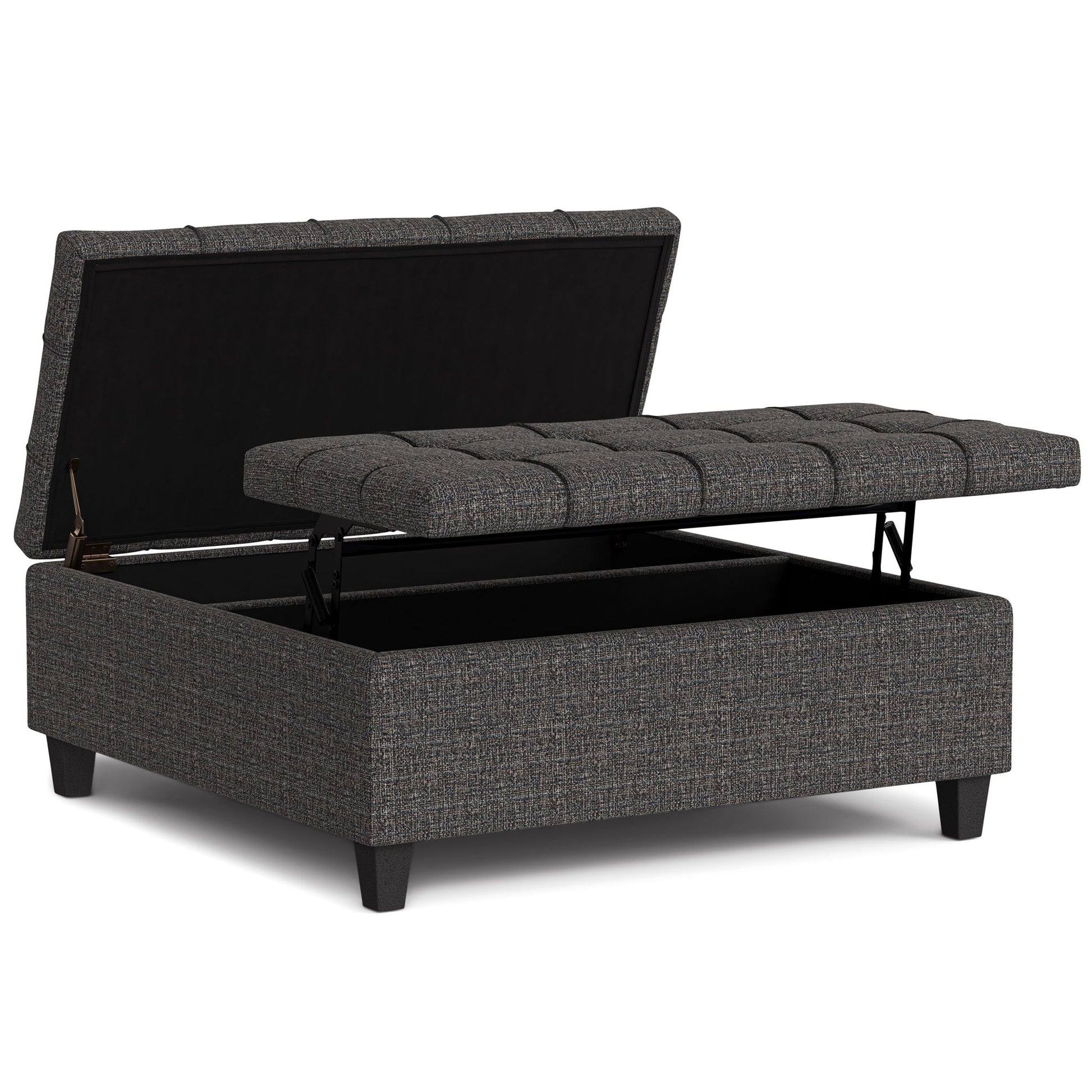 The Harrison Upholstered Coffee Table Storage Ottoman features a gray tufted, hinged lid, open to show its empty storage compartment. It stands on four short black legs.