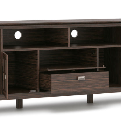 The Artisan TV Media Stand features dark wood, open shelves, two cable management holes, a closed left cabinet, center pull-out drawer, right-side open compartments, and short legs.