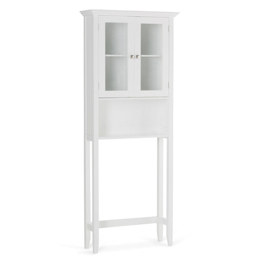 The Acadian Space Saver Cabinet in Pure White features glass double doors, two small knobs, an open lower shelf, and tall legs designed to fit conveniently over a toilet.