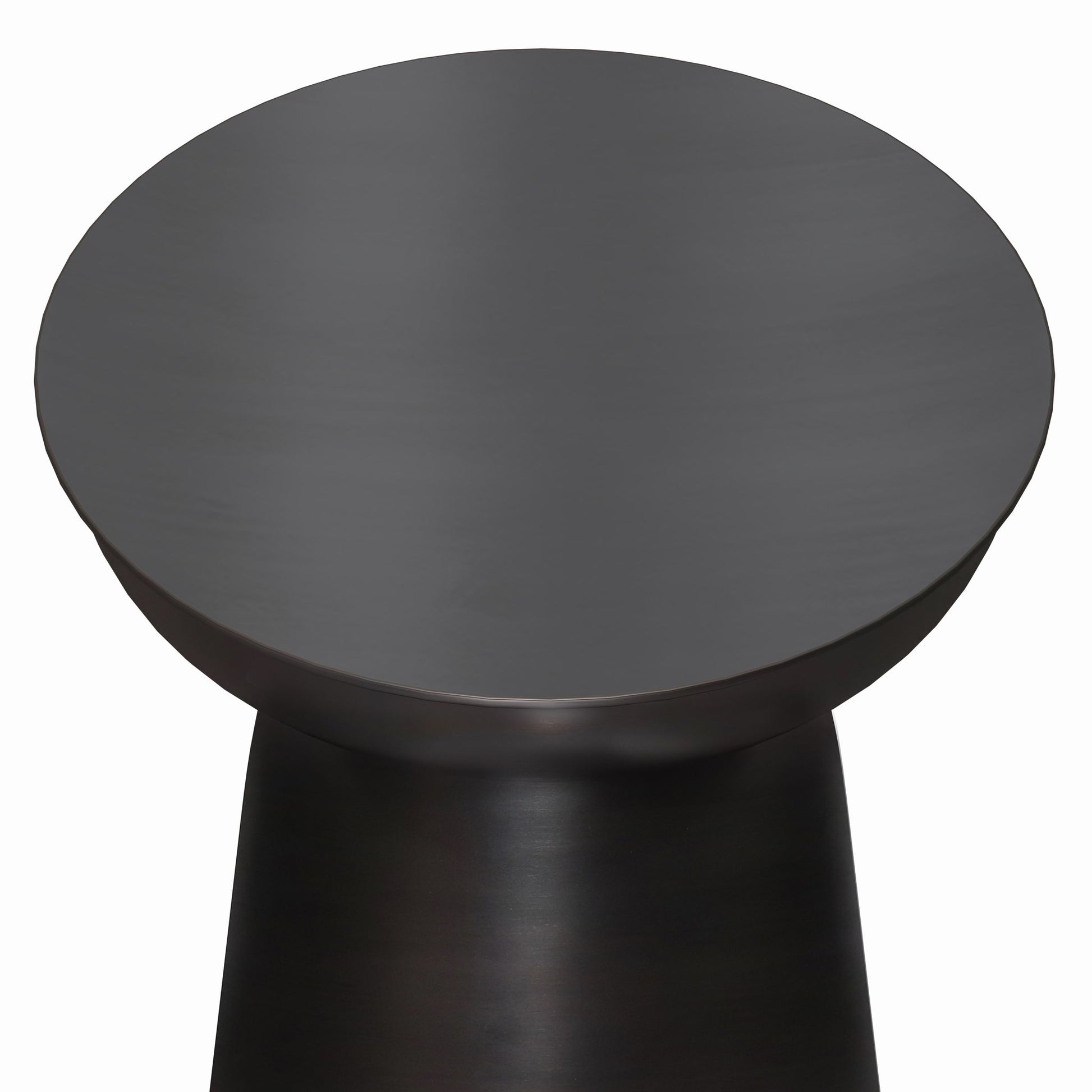 The Toby Handcrafted Metal Accent Table features a smooth, round black top and a subtly tapered cylindrical base, crafted from metal and displayed from an angled top-down view against a white background.