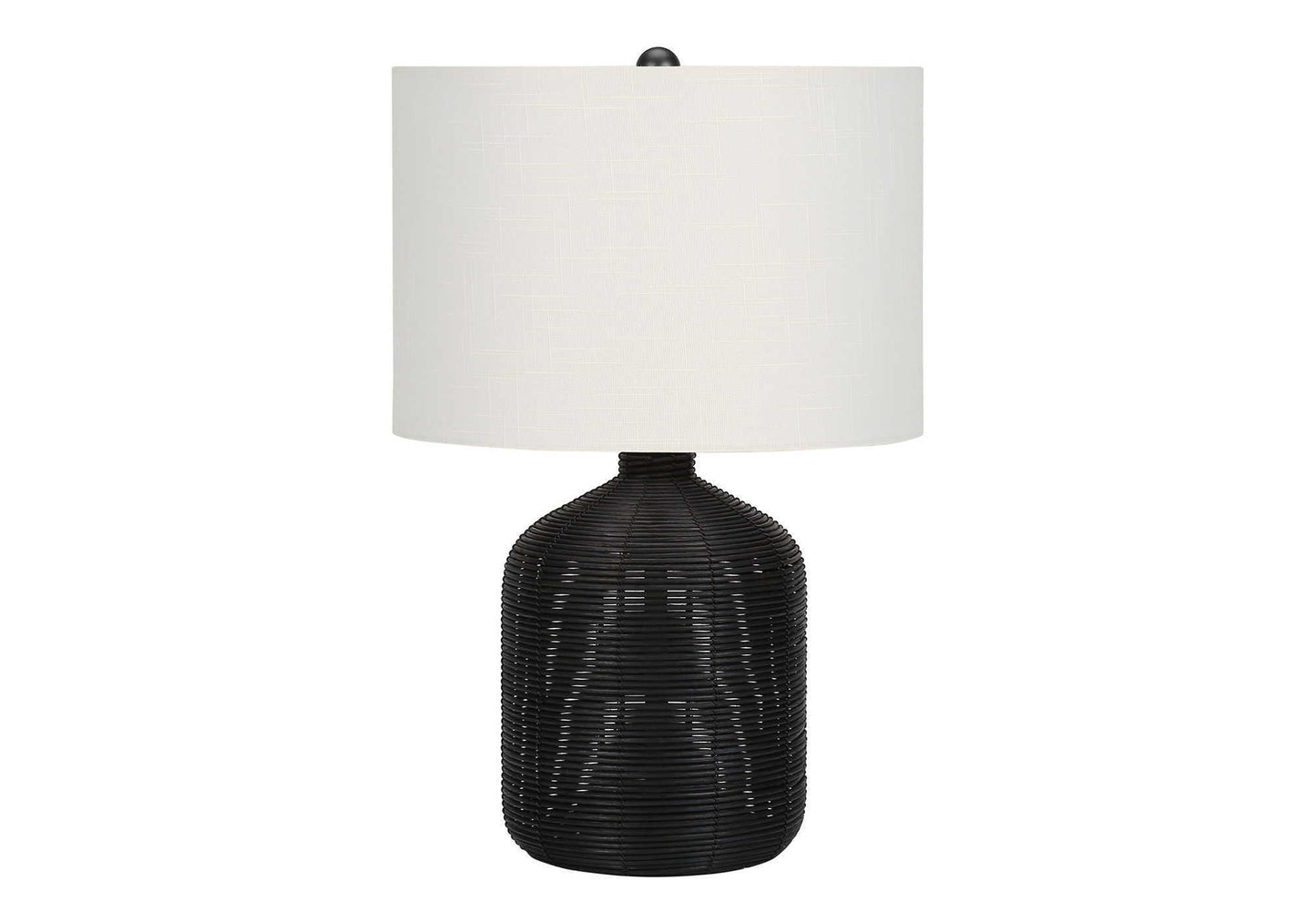 A modern table lamp with a rattan-textured, rounded black base and a large cylindrical white shade, shown against a plain white background.