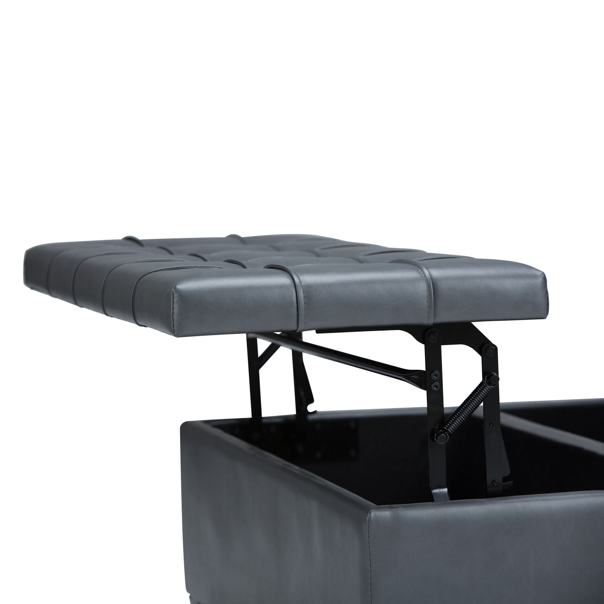 A close-up of the Harrison - Upholstered Coffee Table Storage Ottoman in black shows its tufted, padded top lifted to reveal hidden storage inside, with the lid raised on metal hinges against a white background.
