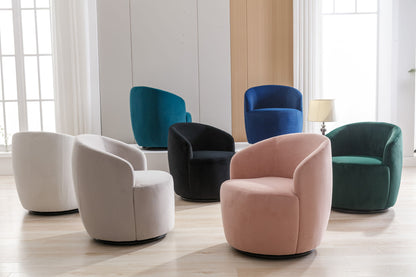 Six Velvet Fabric Swivel Accent Armchair Barrel Chairs with powder-coated metal rings in white, teal, black, blue, green, and pink are arranged in a bright room with wooden floors and large windows.