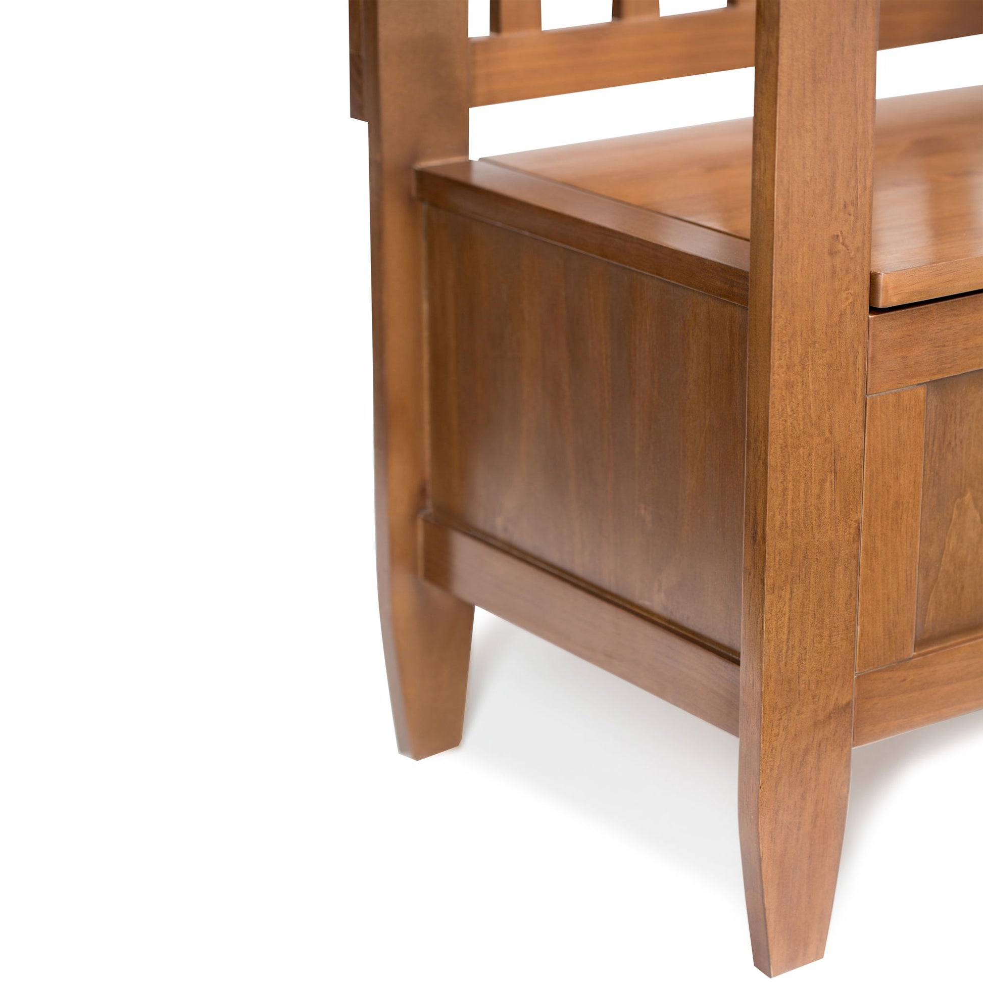 Close-up of the Brooklyn Entryway Storage Bench in Medium Saddle Brown, featuring vertical slats on the back and a storage compartment beneath the seat, displayed against a white background.