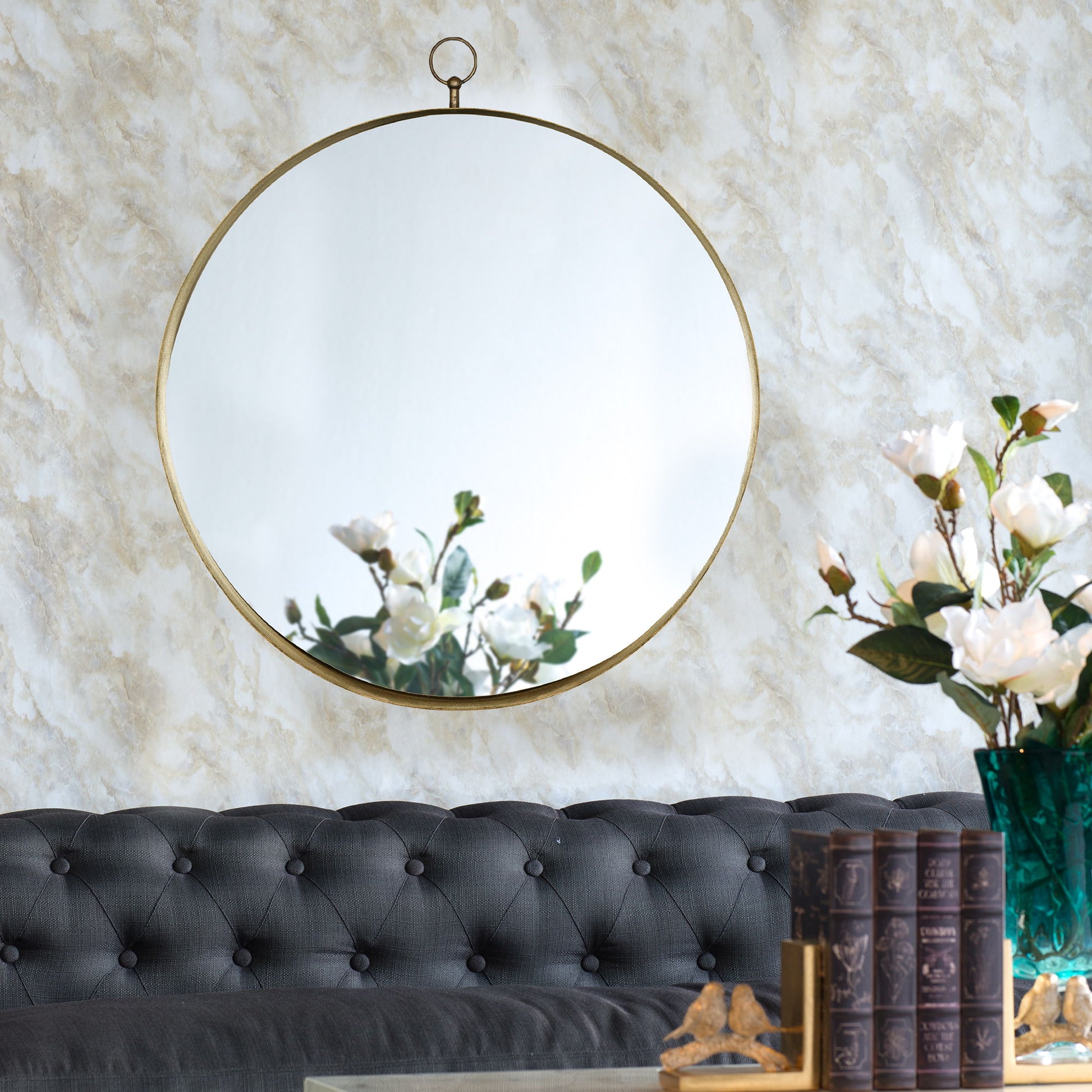 A Round Mirror with an iron frame, perfect for living rooms, bedrooms, vanities, entryways, or hallways.