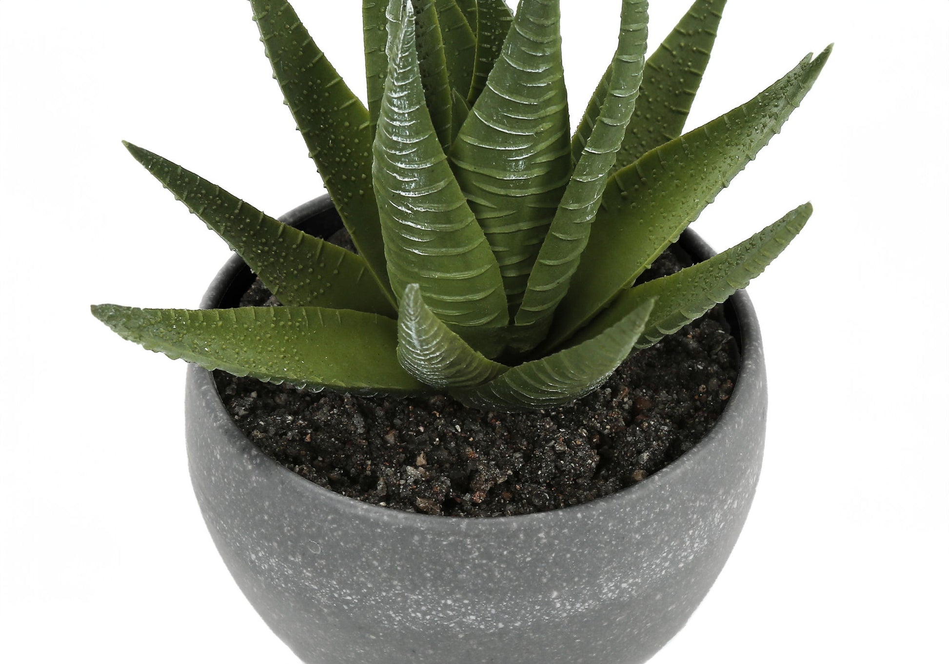 A set of three 6" tall artificial succulent plants with thick, green leaves in round gray pots, perfect for indoor table décor. Faux greenery adds a decorative touch to any room.