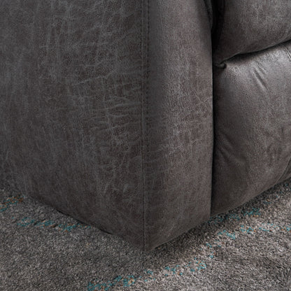 Close-up of the bottom corner of the Contemporary Glider Recliner With Swivel Function, upholstered in dark gray fabric, resting on a textured gray carpet with subtle blue accents.