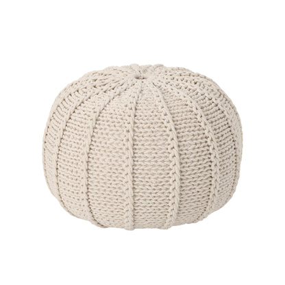 The Bordeaux Knitted Cotton Round Pouf Ottoman is a beige, ribbed, textured floor cushion perfect for seating or decor.