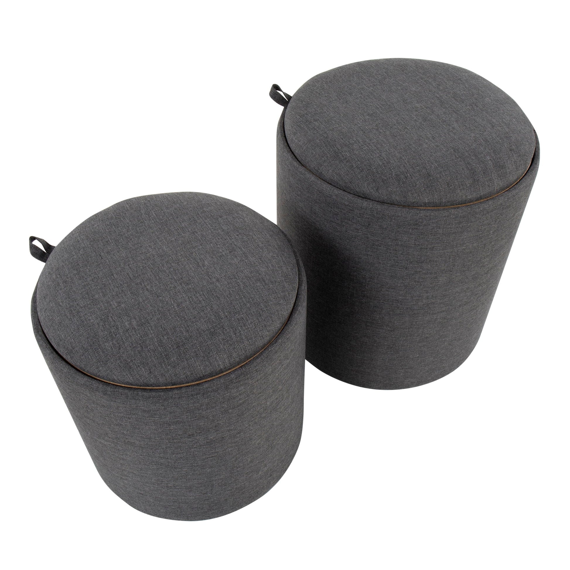 The Tray - Contemporary Nesting Ottoman Set includes two round, dark gray upholstered ottomans with fabric handles on top, shown side by side against a white background.