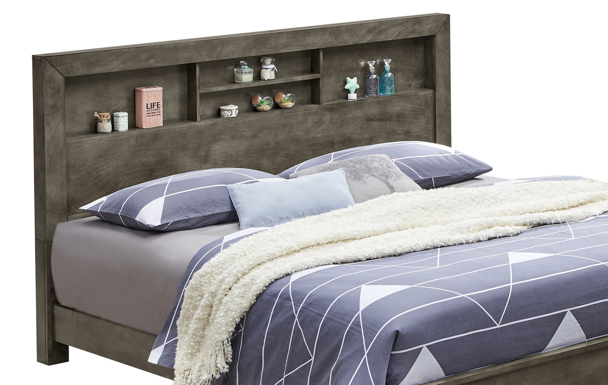 The Bed With Transitional Design Stylish features a gray headboard with built-in shelves displaying décor, and is dressed in gray and white geometric bedding with a white textured blanket at the foot.