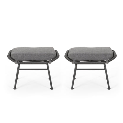 A set of two Outdoor Modern Boho Wicker Ottomans with gray cushions and black metal legs, featuring woven black wicker sides, are shown side by side on a white background.