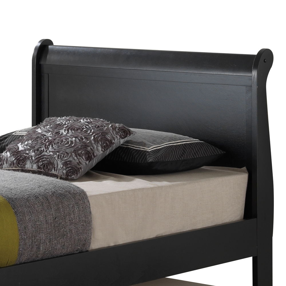 The Elegant Trundle Bed With Timeless Charm features a black wooden frame with a high headboard, gray and black pillows, and a gray blanket set atop a beige mattress.