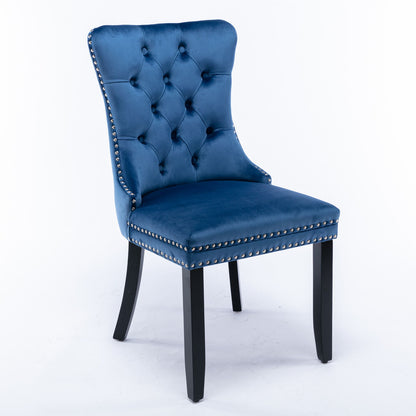 Set of 2 Nikki modern, high-end tufted velvet upholstered dining chairs with solid wood legs and nailhead trim, shown against a plain white background.