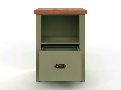 The Couch.com Vineyard Drawer File features a sage green wood construction, fruitwood top, open shelf, and a partially open drawer with a brass handle, displayed against a plain white background.