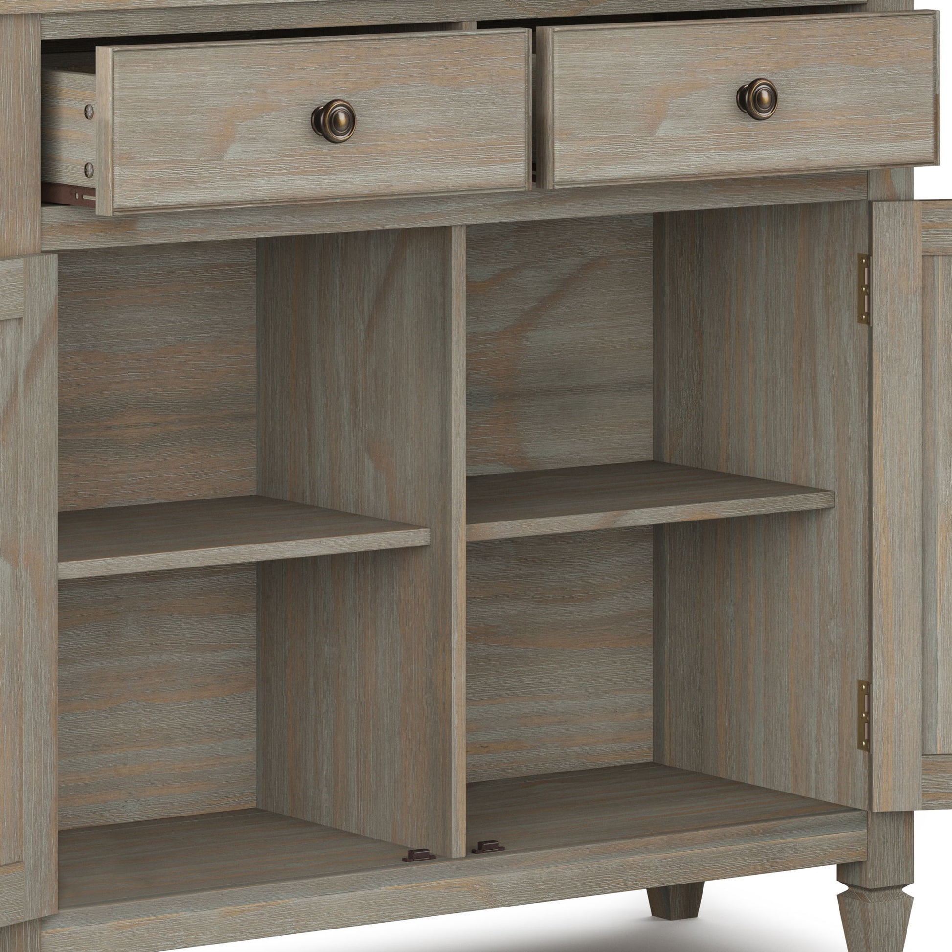 The Connaught Entryway Storage Cabinet in distressed gray features two open top drawers, two lower doors revealing four interior shelves, and a rustic finish.