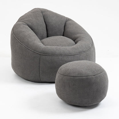 The Bedding Bean Bag Sofa Chair, made of high pressure foam with a matching footrest, features a modern gray fabric design with a rounded back and both pieces are shown against a plain white background.
