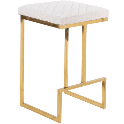 The Joel - Mid Century Modern Luxury Upholstered Stool features a gold metal frame with clean, geometric lines, a footrest, and a cushioned textured white seat for a stylish and comfortable addition to any modern bar or kitchen.