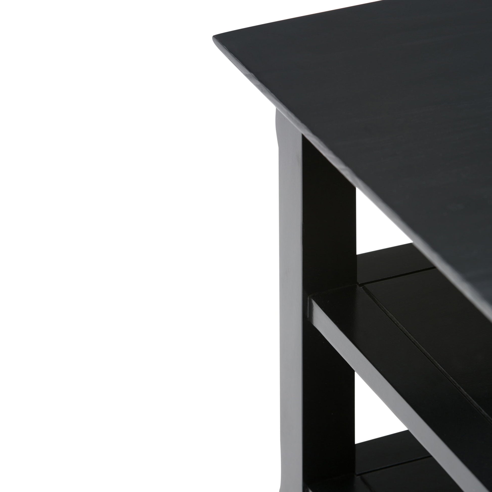 Close-up of the Acadian - Handcrafted End Table, featuring a black wooden finish and two lower shelves, set against a white background.