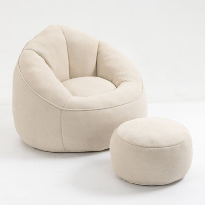 The Bedding Bean Bag Sofa Chair, upholstered in beige high pressure foam, features rounded cushioned edges and comes with a matching round footrest, both displayed on a white background.