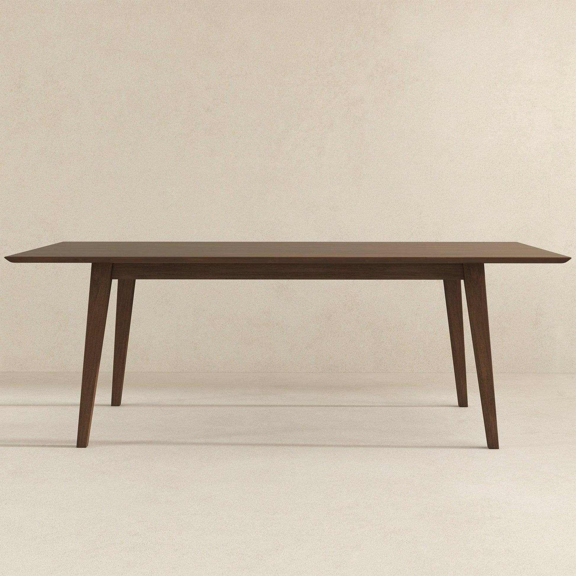 The Levi - Modern Style Rectangular Dining Kitchen Table, featuring angled legs, is displayed against a plain beige background.