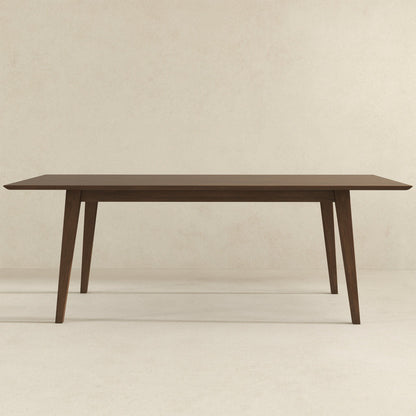 The Levi - Modern Style Rectangular Dining Kitchen Table, featuring angled legs, is displayed against a plain beige background.