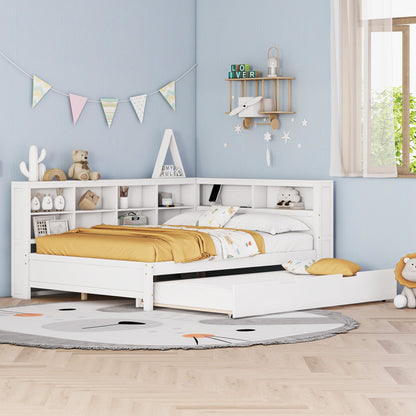 A tidy children's bedroom features a white Wooden Full Size Daybed with Twin Size Trundle, storage shelf, and USB charging ports, styled with yellow and white bedding, soft toys, wall shelves, bunting, and a round animal-themed rug on a light wooden floor.