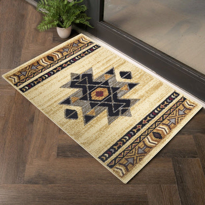 The Tribes - GC_YLS4006 Southwest Area Rug, featuring a geometric tribal pattern in beige, black, and dark red, lies on a wooden floor by a glass door with a potted green plant nearby.