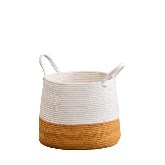 The Francis - Cotton Round Laundry and Storage Basket features two handles, a white top half, and a warm mustard yellow bottom half. It is shown against a plain white background.
