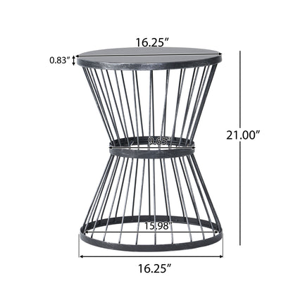 The Lassen - Modern Outdoor Side Table features a black metal hourglass design with a 16.25" round top (0.83" thick), stands 21" tall, and includes base and middle ring diameters of 16.25" and 9.65", respectively.