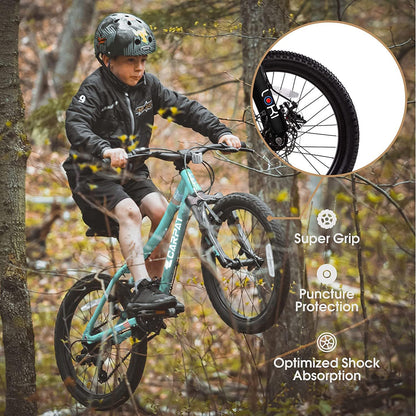 A child with a helmet rides the S20101 20" Kids' Bike, a blue 7-speed mountain bike for ages 8-12, featuring front suspension, disc and V-brakes. Inset shows the wheel with super grip, puncture protection, and shock absorption.