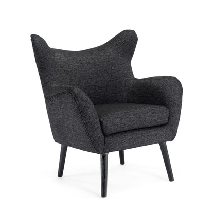 The Mid-Century Modern Arm Chair features a wingback design, dark gray textured fabric, wide curved armrests, and four black wood legs.