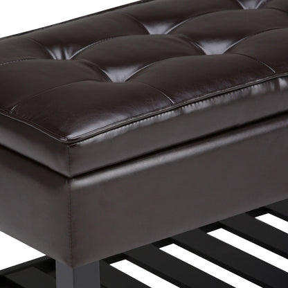 Close-up of the Cosmopolitan - Storage Ottoman Bench With Open Bottom in Tanners Brown, featuring tufted leather upholstery, visible stitching, dark legs, and a slatted wooden shelf beneath.