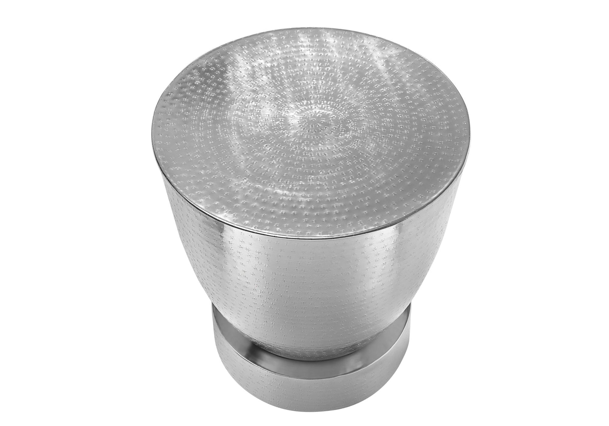 The Drum Accent Side Table features a round, metallic silver drum-style design with a hammered surface and smooth base, showcasing contemporary and modern style on a white background.