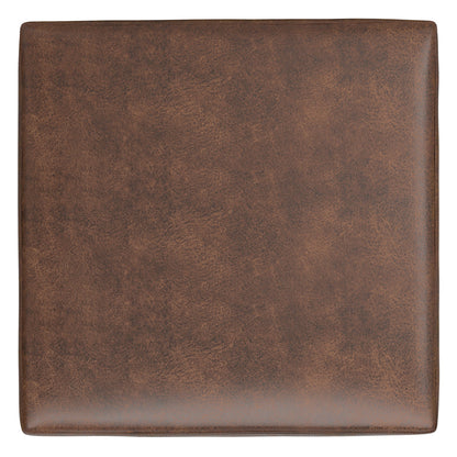 The Shiloh Multifunctional Square Storage Ottoman features a brown leather exterior with a smooth, slightly mottled texture, displayed from above on a white background.