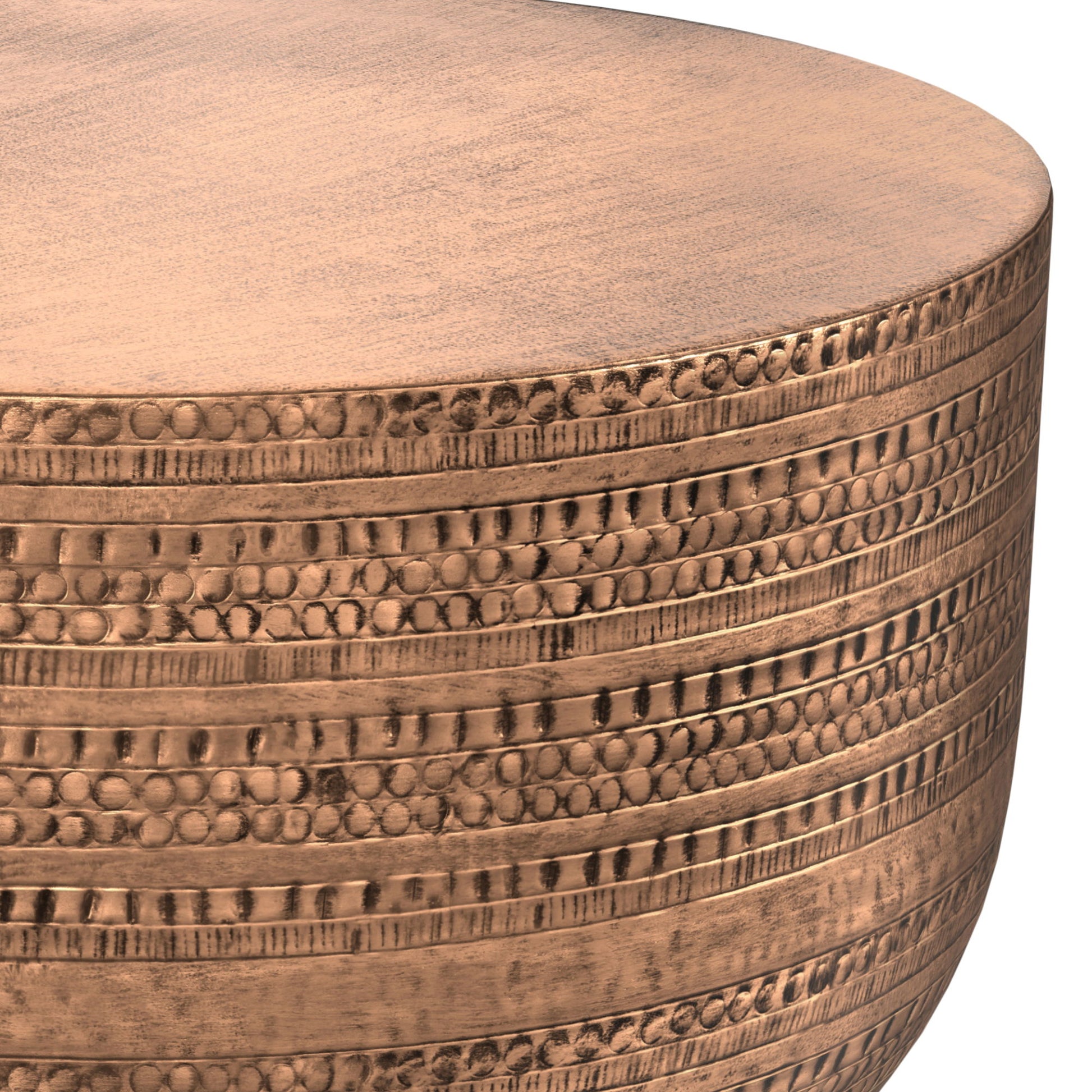 Close-up of the Johnsen Handcrafted Metal Coffee Table, featuring a round, copper-toned design with a hammered textured surface and decorative horizontal rows of dots and lines.