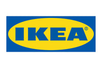 The image displays the IKEA logo, which consists of the brand name "IKEA" in bold blue letters centered within a yellow oval. This yellow oval is set against a rectangular blue background. IKEA is a globally recognized furniture and home goods retailer.
