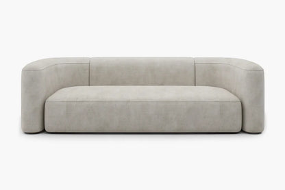 Introducing the Mellow Sectional Sofa by Acanva, a modern piece with a minimalist design featuring light gray, smooth fabric. This sofa boasts a low backrest and rounded armrests, offering a sleek and contemporary aesthetic. It is elegantly displayed against a plain white background.