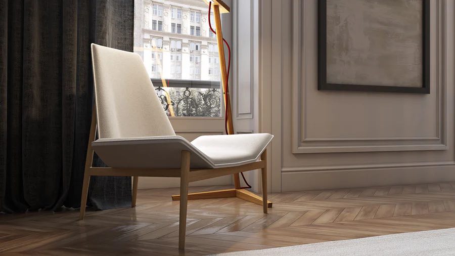 Modern minimalistic interior featuring a sleek beige lounge chair with wooden legs positioned in front of a large window framed by dark curtains. A floor lamp with a red cord stands adjacent, and a framed abstract painting adorns the wall. Herringbone parquet flooring.