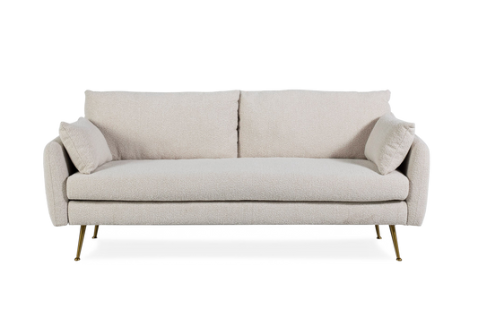 The Park Sofa is a modern light beige upholstered sofa with two seat and back cushions, two side pillows, and slim gold metal legs, displayed against a plain black background.