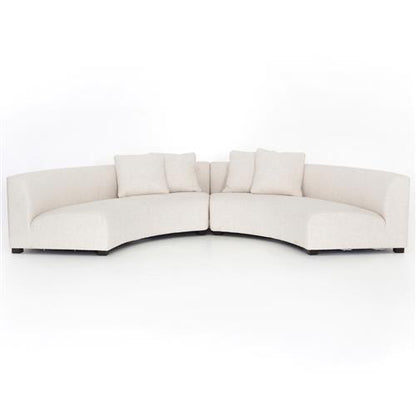 Zoe Modern White Performance Black Birch Wood Piece Curved Sectional, complete with three matching cushions, elegantly arranged against a simple white background.