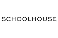 The image shows the word "SCHOOLHOUSE" written in black, capitalized letters against a plain white background. The font is clean and simple. There are no other elements in the image.