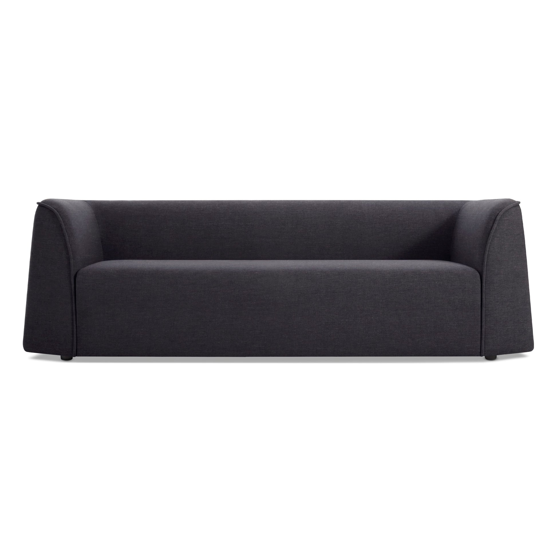 The Thataway 88" Sofa in Tofte Navy features a boxy, minimalist design with a low backrest and wide armrests, shown against a plain white background.